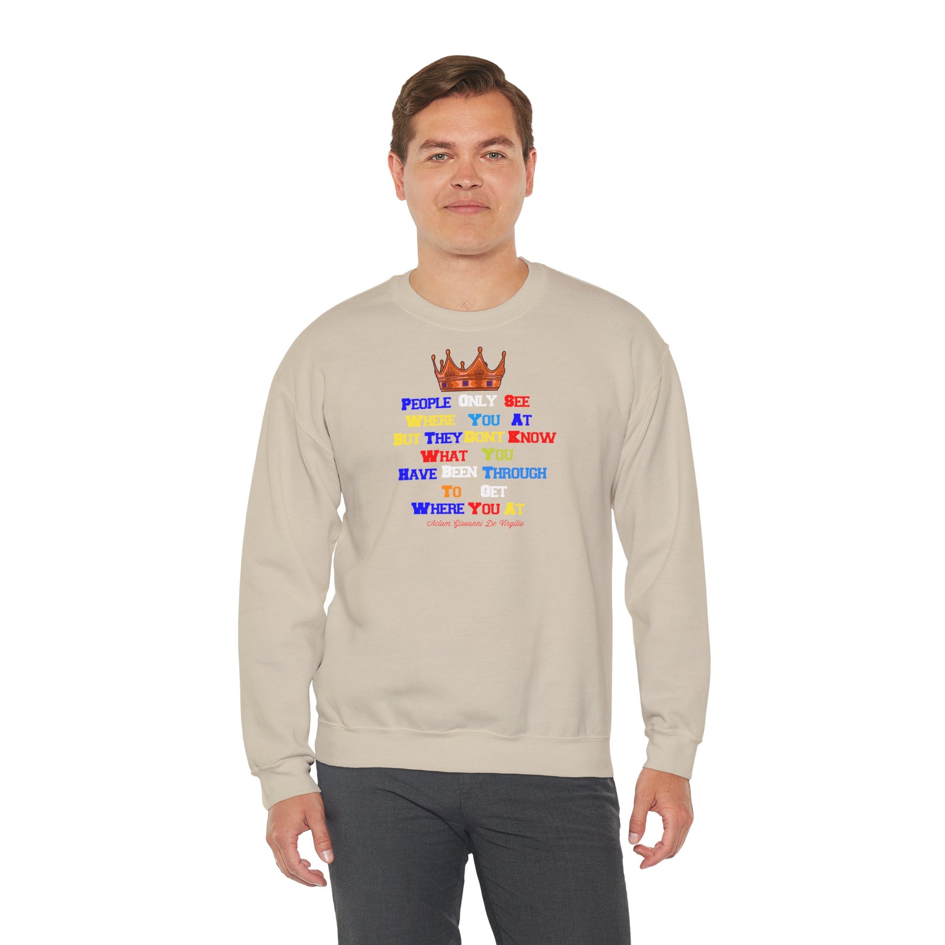 Model wearing The Original sweatshirt with colorful faith-inspired statements and crown