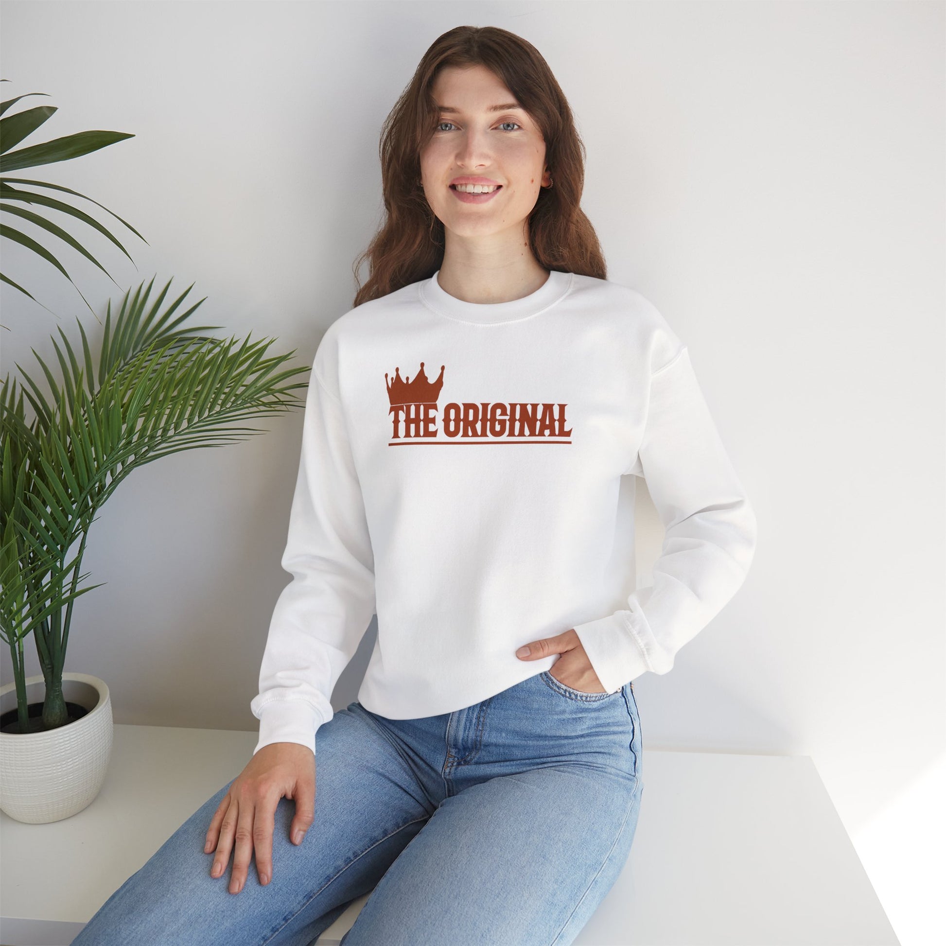 Lifestyle photo of unisex sweatshirt with red logo styled casually