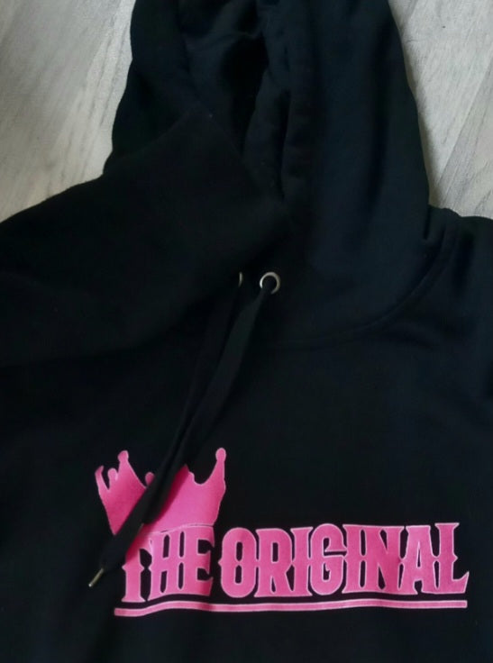 close up on hoodie and brand name on black hoodie dress