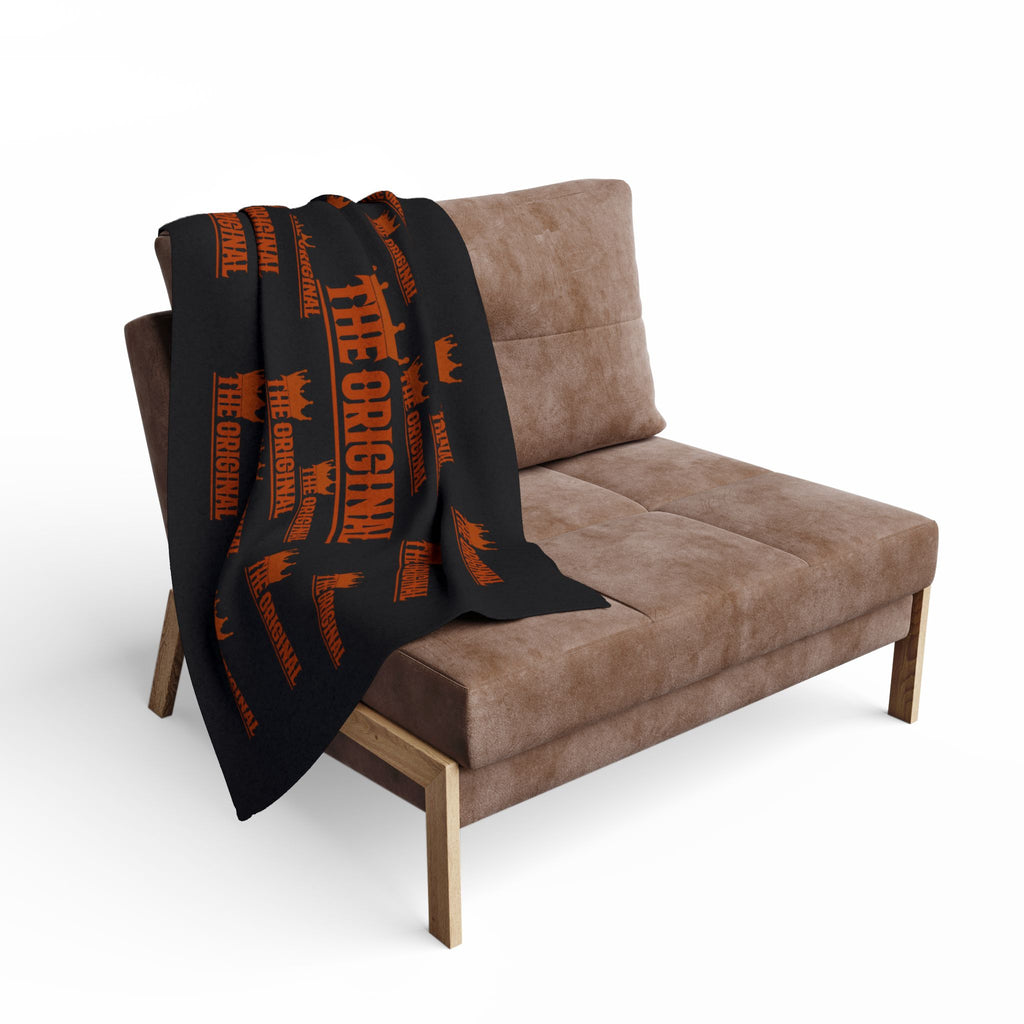 Black fleece blanket with bold red Christian logo – The Original faithwear design