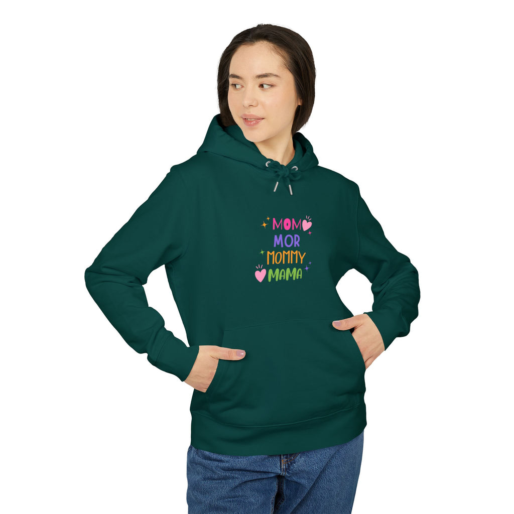 Woman wearing faithwear hoodie with “MOM” text in minimalist style