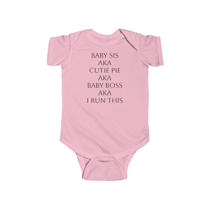 Close-up of BOLD LINES print on babypink infant onesie
