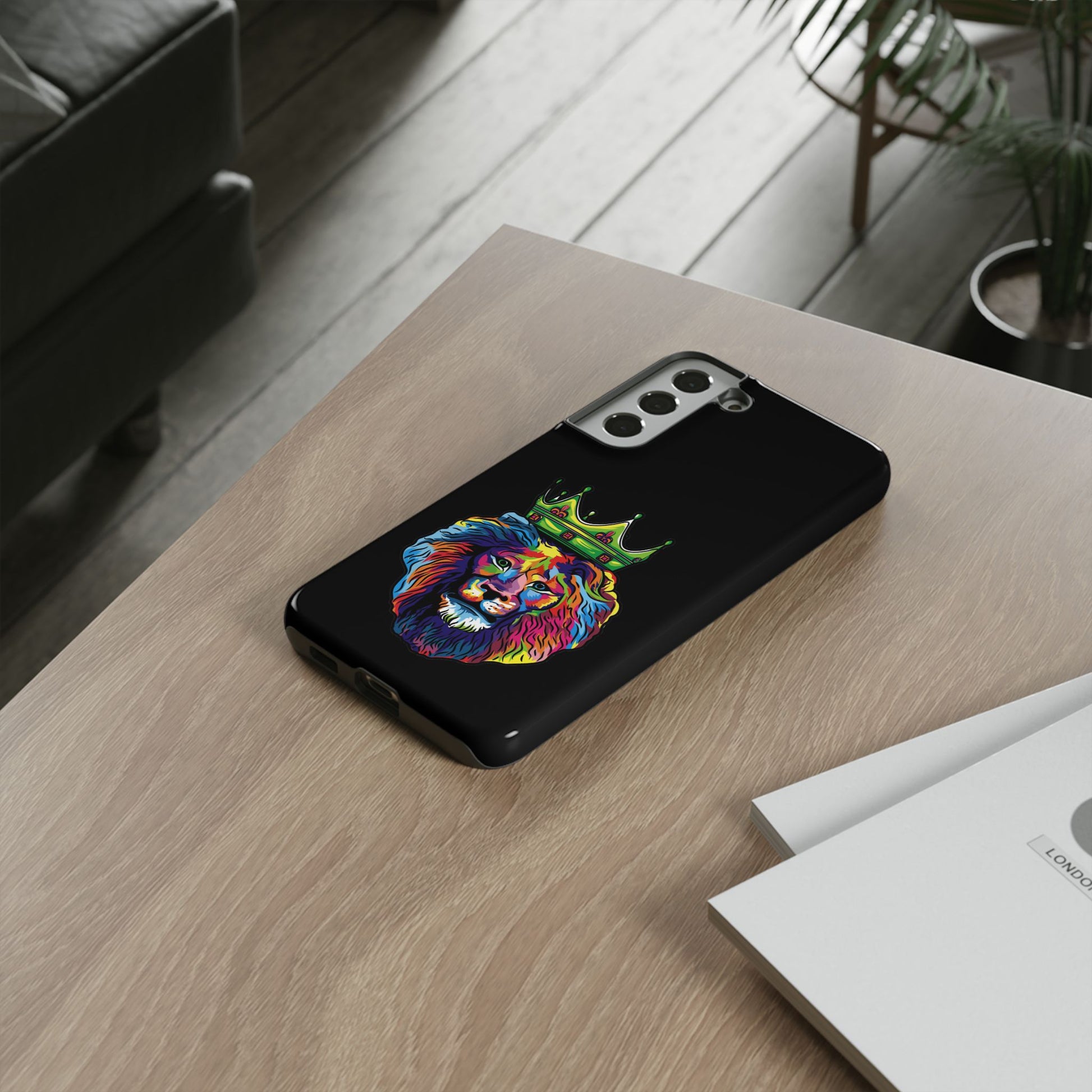 Faithwear black phone cover with colorful lion – Christian streetwear design full of hope and strength
