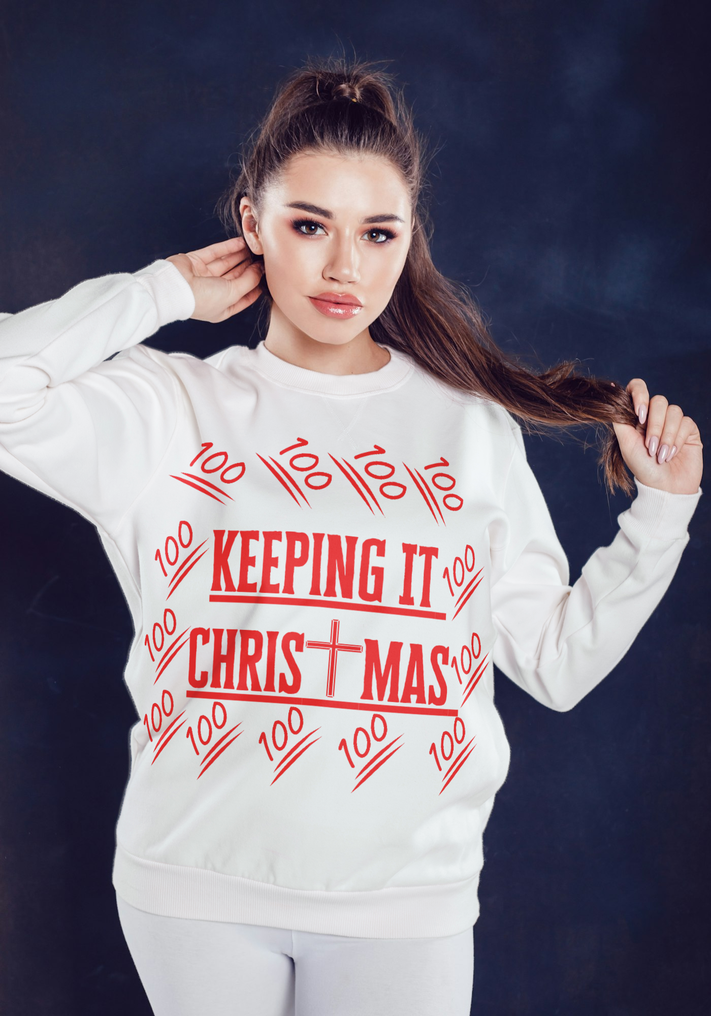 Model wearing Keeping it Christmas imprint on white sweatshirt - Faithwear