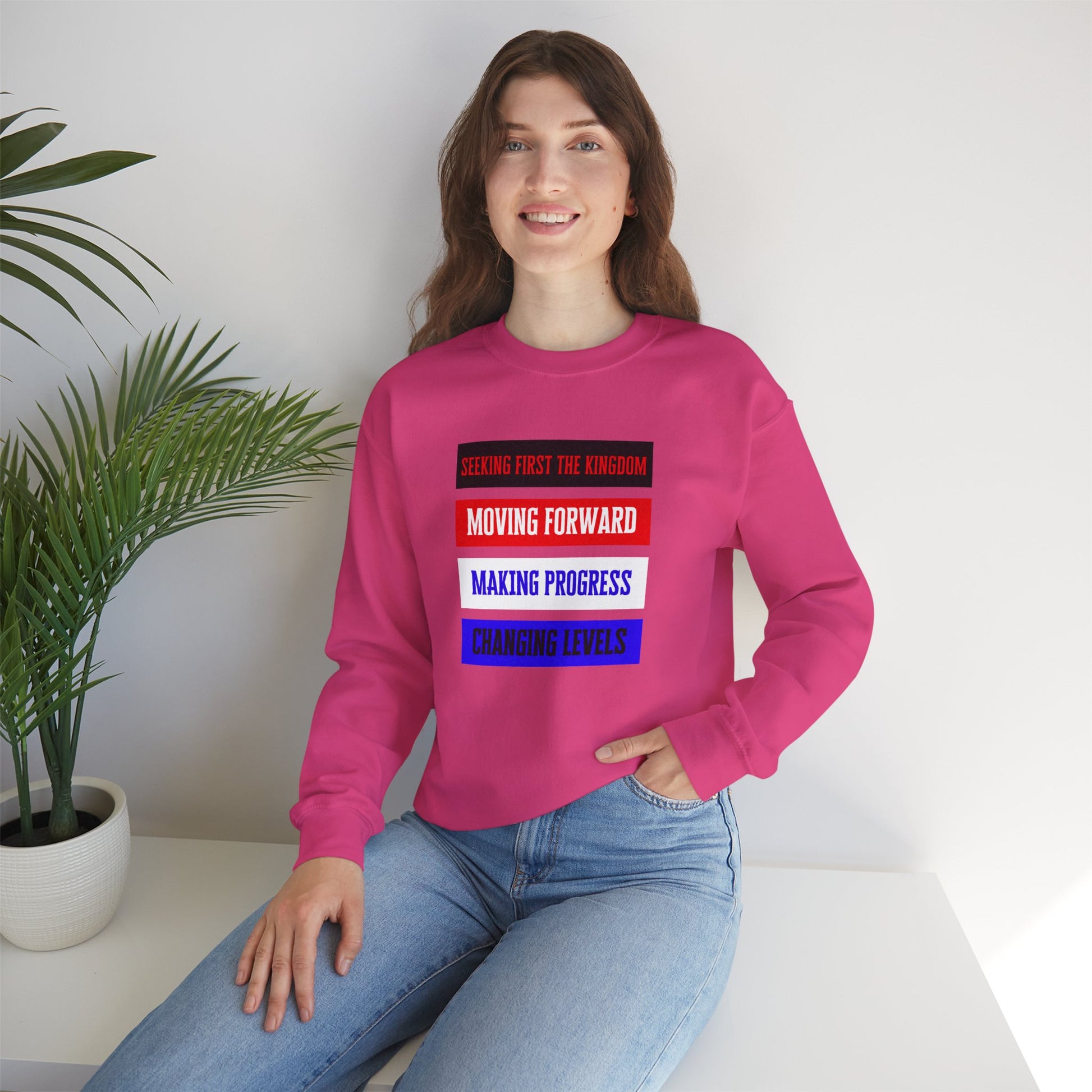 Model wearing pink Moving Forward sweatshirt – outdoor Christian lifestyle