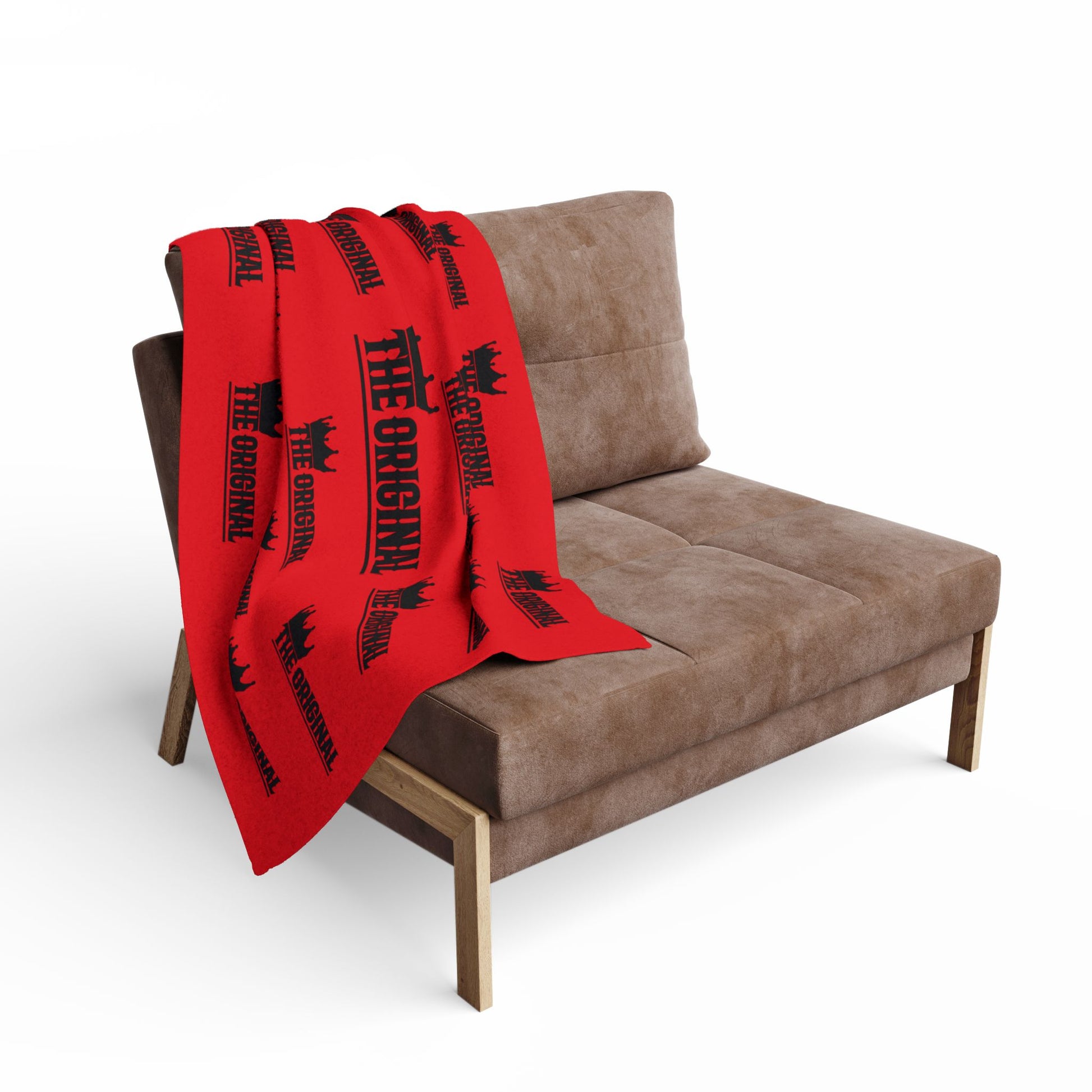 Bold red throw blanket featuring black THE ORIGINAL text design